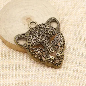 Vintage 56x50mm bronze leopard head filigree pendant for DIY jewelry and crafts