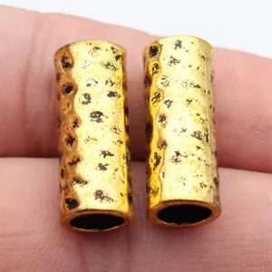 Set de dos cuentas de tubo de metal martillado dorado para rastas y diseño de joyas