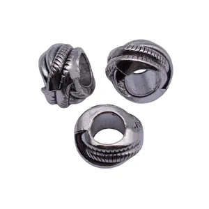 Perles d'espacement en métal texturé argent antique pour dreadlocks et bijoux artisanaux.