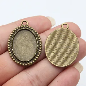 Οβάλ βάσεις μενταγιόν 18x25mm σε αντικέ μπρούτζο για κατασκευή DIY κοσμημάτων