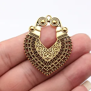 Antique gold finished hollowed-out textured metal pendant for earring making 48x37mm