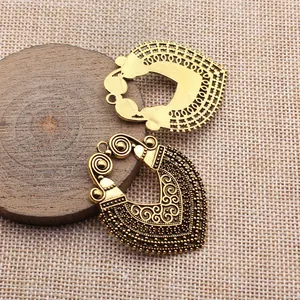 Vintage 48x37mm metal earring pendant charms with intricate ethnic tribal patterns