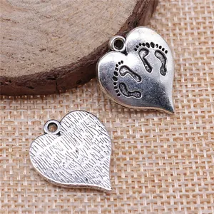 Antique silver-tone heart-shaped charm with baby footprint engraving 21x17mm size