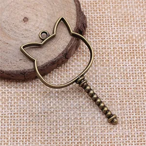 Antique bronze hollow cat head shaped resin bezel frame pendant for DIY jewelry making