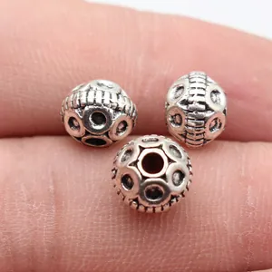 Detailed vintage silver-plated metal spacer beads with circular texture 9.7mm DIY jewelry making