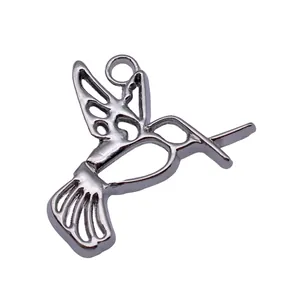 Detailed hollow-out hummingbird pendant charm in silver tone finish for DIY jewelry