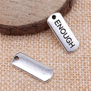 Silver rectangular metal charm pendant with ENOUGH engraving for jewelry making crafts