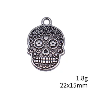 Colgante calavera vintage 22x15mm con motivo floral para la creación de joyas DIY