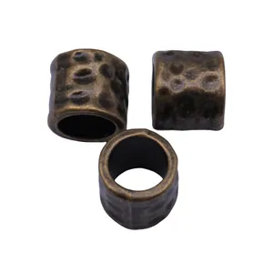 Set of three antique bronze hammered metal large hole tube beads for dreadlocks jewelry.