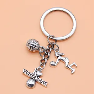 Silver volleyball player keychain with I Love Volleyball charm and ball pendants