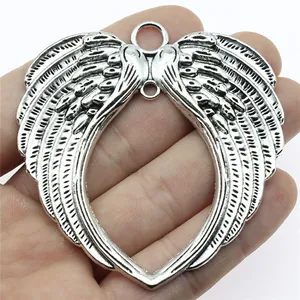 Grand pendentif en forme de cœur à double aile argenté pour création de bijoux DIY