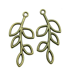 Pair of antique bronze hollow leaf branch charms for DIY jewelry making, 41x20mm size