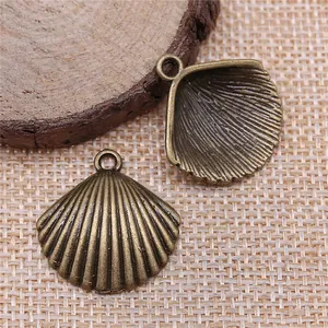 Pendentifs en forme de coquillage bronze antique pour la création bijoux 25x24mm