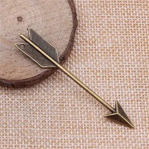 Vintage bronze arrow pendant for DIY jewelry making, 64x11mm metal charm accessory.