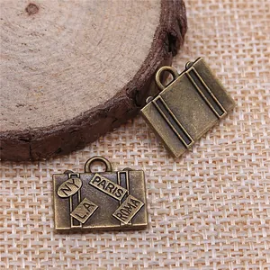 Vintage bronzen kofferbedeltjes voor DIY sieraden maken, mini reishangers van 17x15mm