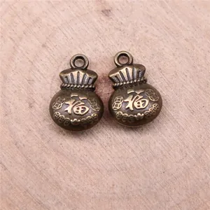 Ciondoli portafortuna in lega di bronzo vintage con carattere Fu su legno