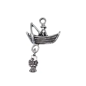 Antique silver fishing boat charm pendant with dangling fish for DIY jewelry making