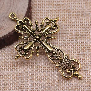 Ornate vintage gold-tone cross pendant for DIY jewelry making and necklaces 64x43mm