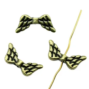 Antique bronze angel wing spacer beads 19x9mm for vintage jewelry making DIY projects