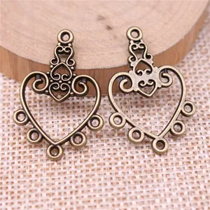 Vintage bronze 30x21mm heart filigree earring connectors for jewelry making.