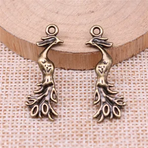 Antique bronze phoenix peacock bird pendant charm for vintage jewelry DIY making.