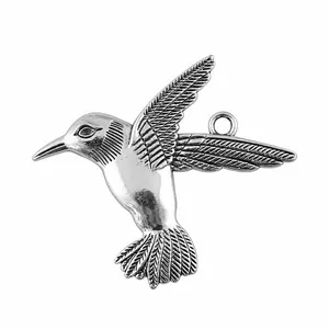 Large vintage silver-toned flying hummingbird pendant for DIY jewelry making 68x61mm