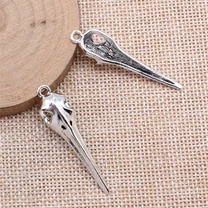 Pendentifs de crâne à bec d'oiseau gothique en argent antique pour bijoux DIY