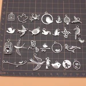 27 pieces antique silver bird charms set for DIY jewelry making with swallows and hummingbirds