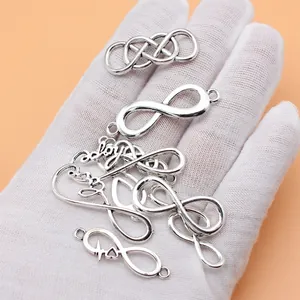 Set of 10 antique silver infinity symbol charms for DIY jewelry making and crafting