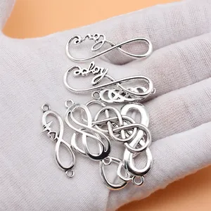 Set of 10 antique silver infinity symbol charms with various word designs for jewelry