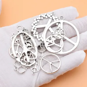 Set van 18 antiek zilveren vredessymbool bedeltjes voor DIY sieraden en ambachten