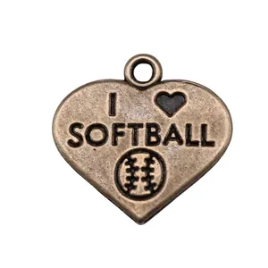 Antique bronze heart-shaped pendant featuring I Love Softball engraving for sports jewelry