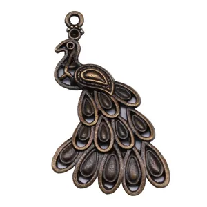 Detailed antique bronze peacock pendant charm for DIY jewelry making and crafts 43x24mm