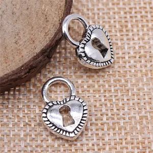 Antique silver heart-shaped lock charms for DIY jewelry making accessories, 17x11mm.