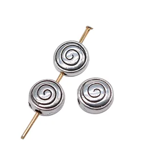 High-quality silver spiral vortex metal beads for DIY jewelry making projects, size 8x8x4mm