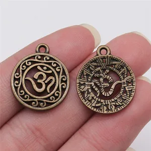 Vintage Bronze Om-Symbol hohl runder Anhänger für handgefertigten Schmuck