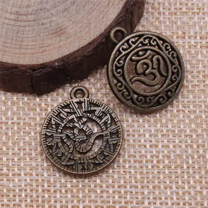 Antike Bronze OM Symbol hohl geschnitzte kreisförmige Anhänger für handgefertigten Schmuck