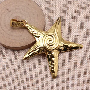 Large golden starfish pendant necklace with spiral center and hammered metal finish