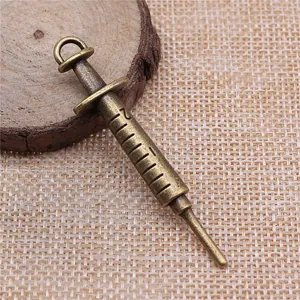 Pendentif seringue vintage en alliage de bronze pour projets de création de bijoux DIY