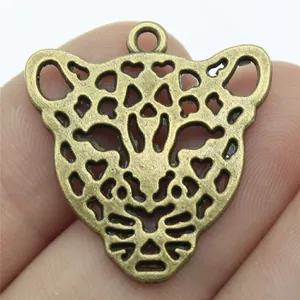 Antique bronze hollowed leopard head pendant charm for DIY jewelry making, 28x26mm