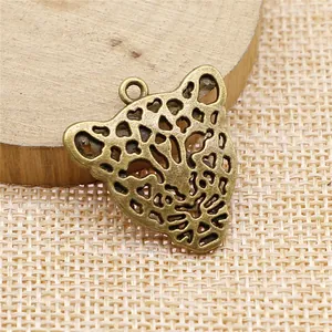 Antique bronze hollow leopard head charm pendant for DIY handmade jewelry findings 28x26mm