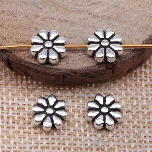 Vintage antique silver flower-shaped spacer beads for DIY jewelry making, 9x9mm.