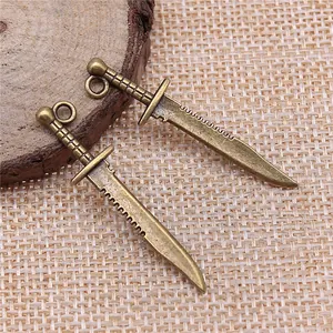 Pair of vintage bronze alloy dagger sword pendants for DIY jewelry making crafts