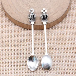 Set of two vintage silver alloy crown spoon pendants for DIY jewelry making and crafts
