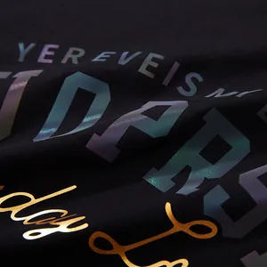 Men's oversized black streetwear T-shirt featuring reflective iridescent letter print detail
