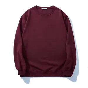 Oversized men's burgundy crewneck sweatshirt in a solid color minimalist casual design