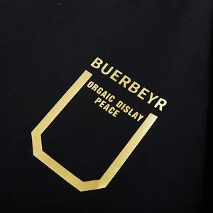 Trendy oversized men's black T-shirt featuring high-quality gold foil graphic print