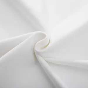 Macro-detail van de hoogwaardige witte ademende katoenen stoftextuur voor een t-shirt
