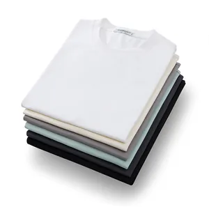 Στοίβα premium ανδρικών T-shirts μεγάλου μεγέθους με πεσμένους ώμους σε διάφορα χρώματα