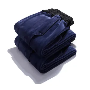 Warm winter men's navy blue velvet joggers with thick fleece lining and black waistband